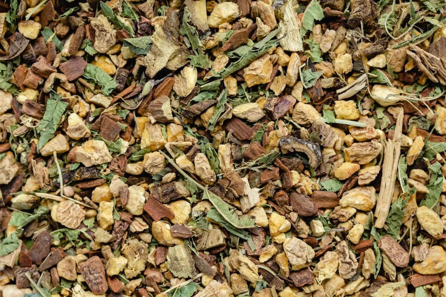 A mix of the ingredients used in Twist Teas' recommended lemon, ginger and honey tea blend